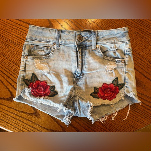 American Eagle Outfitters Pants - American Eagle jean shorts with floral design, size 0, used